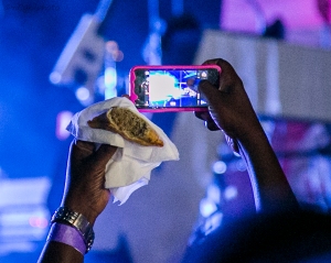 Stromae in Kigali Oct 17,2015 Samosa+Snapping the concert away= How cool is that! By Cyril